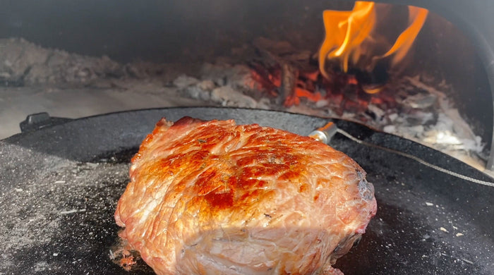A steak in a cast iron pan in the Gozney Dome
