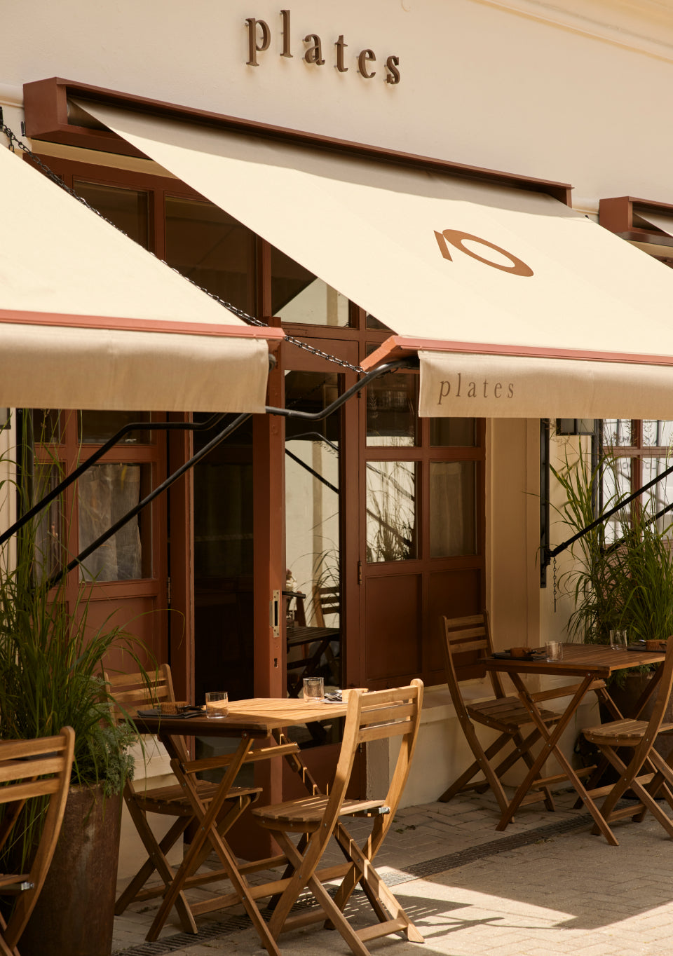 Heather and Paul, Love Logs founders, surrounded by logs and Love Logs cardboard boxes