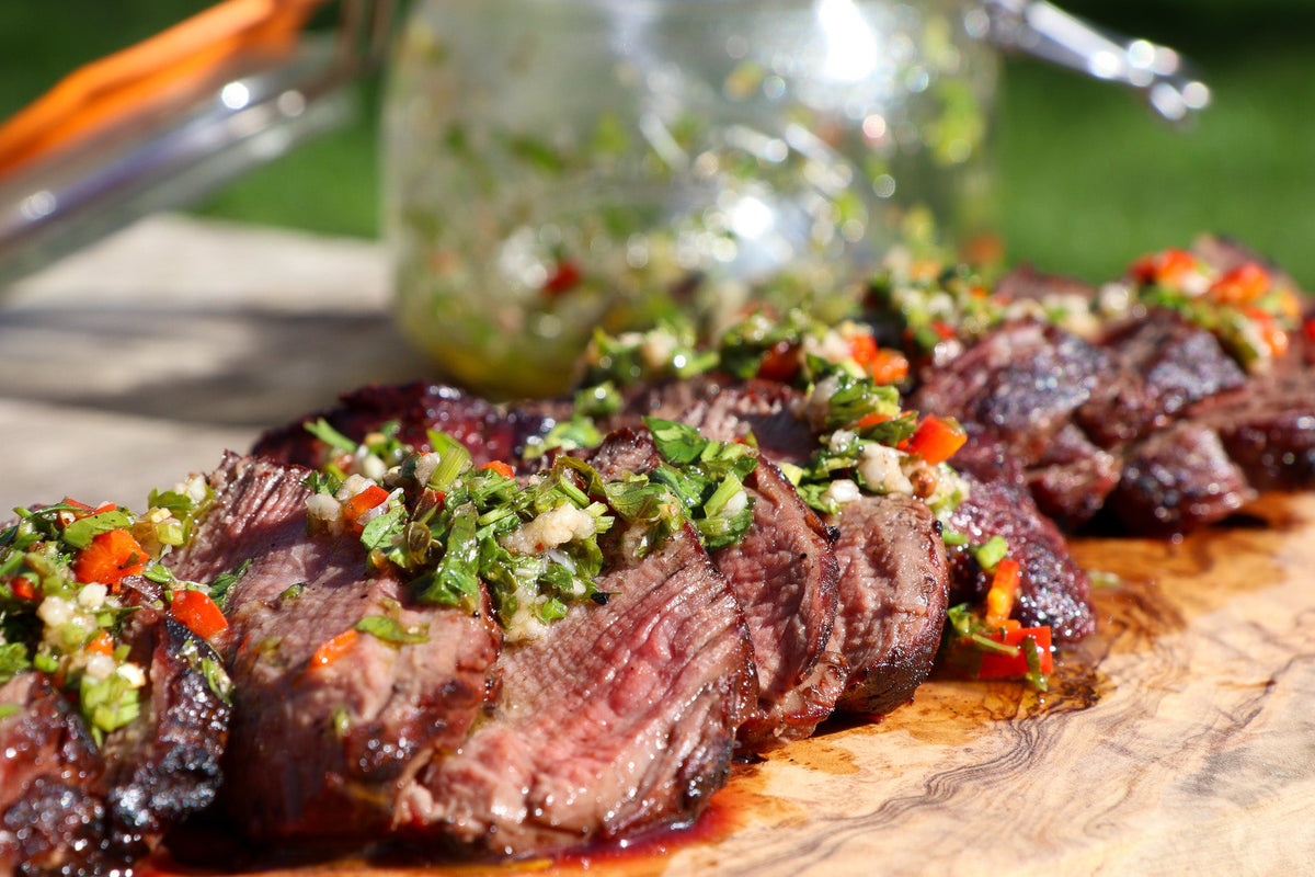 Sliced fillet steak with smoked chimichurri