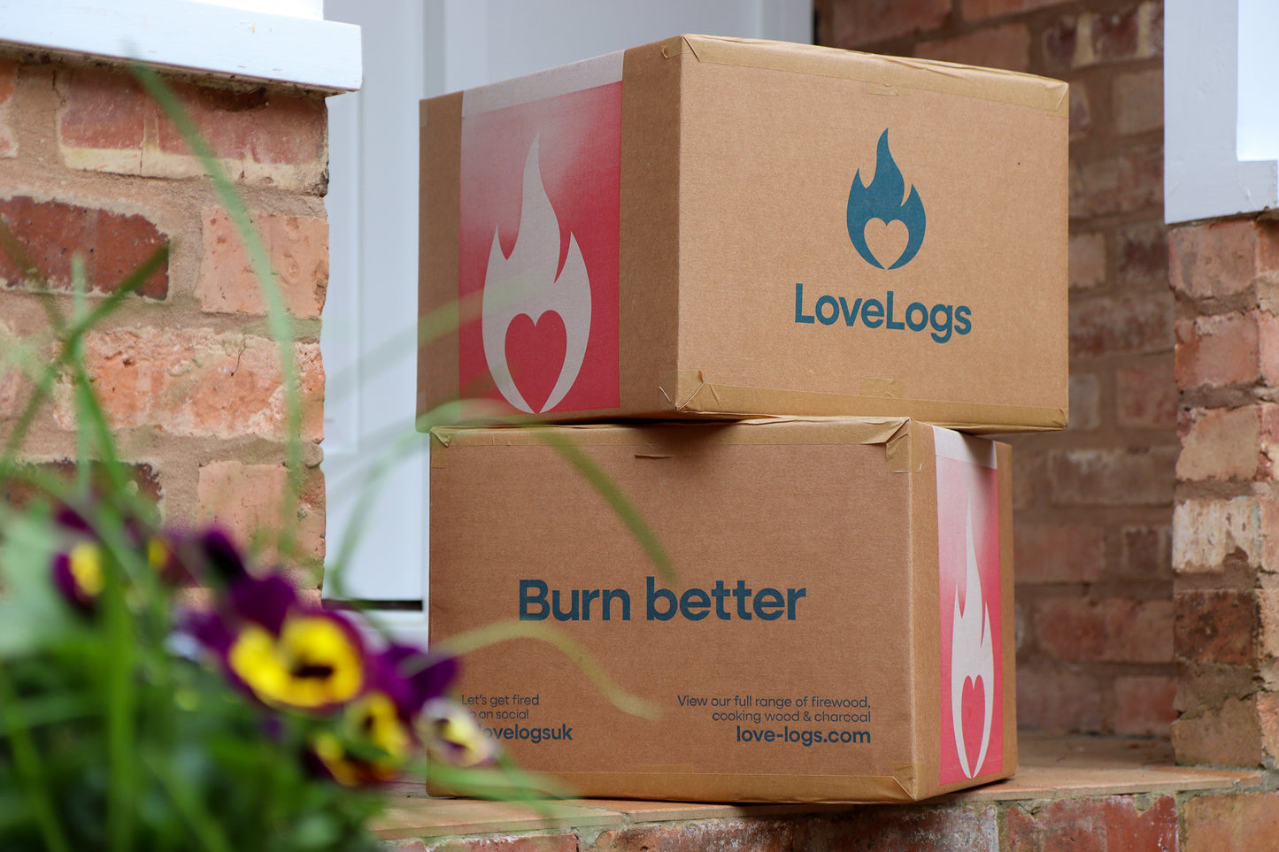 Boxes of Love Logs on Porch Step
