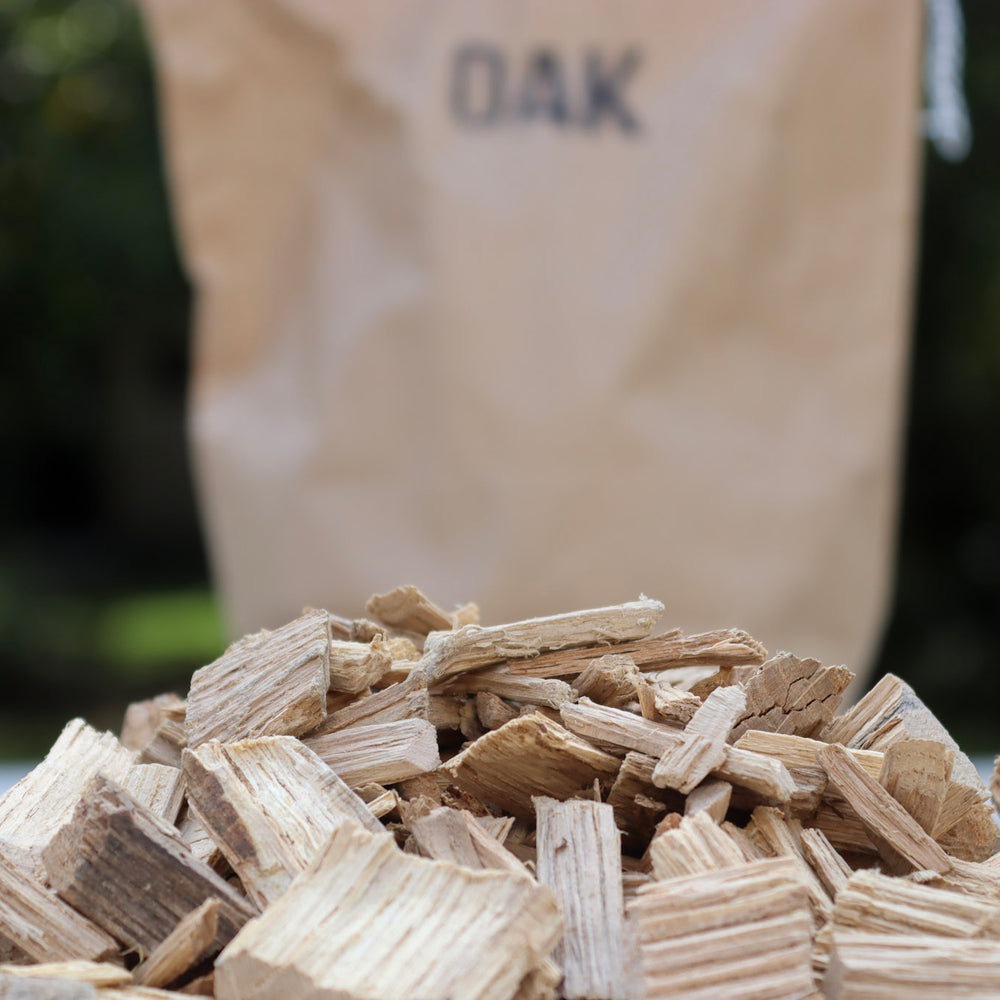 
                      
                        Love Logs British oak smoking chips in pile on tableLove Logs British oak smoking chips in pile on table
                      
                    