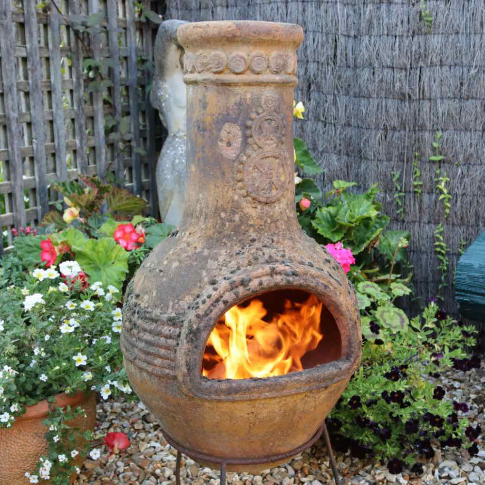 Chiminea Lit With Love Logs Wood