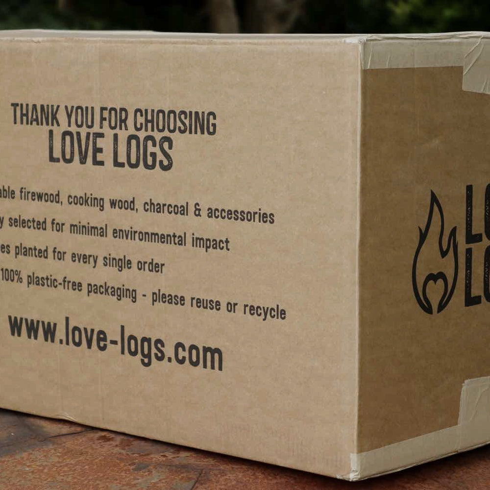 
                      
                        Love Logs Charcoal Shipping Box which reads 'Thank you for choosing Love Logs, sustainable firewood, cooking wood, charcoal and accessories carefully selected for minimal environmental impact.
                      
                    