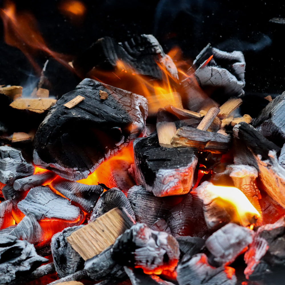 Love Logs Smoking Chips on Bed of Charcoal