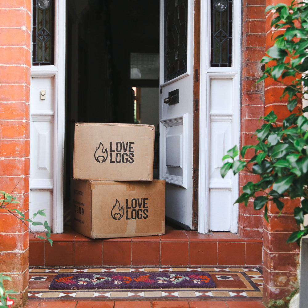 
                      
                        Boxes of Love Logs logs on doorstep
                      
                    