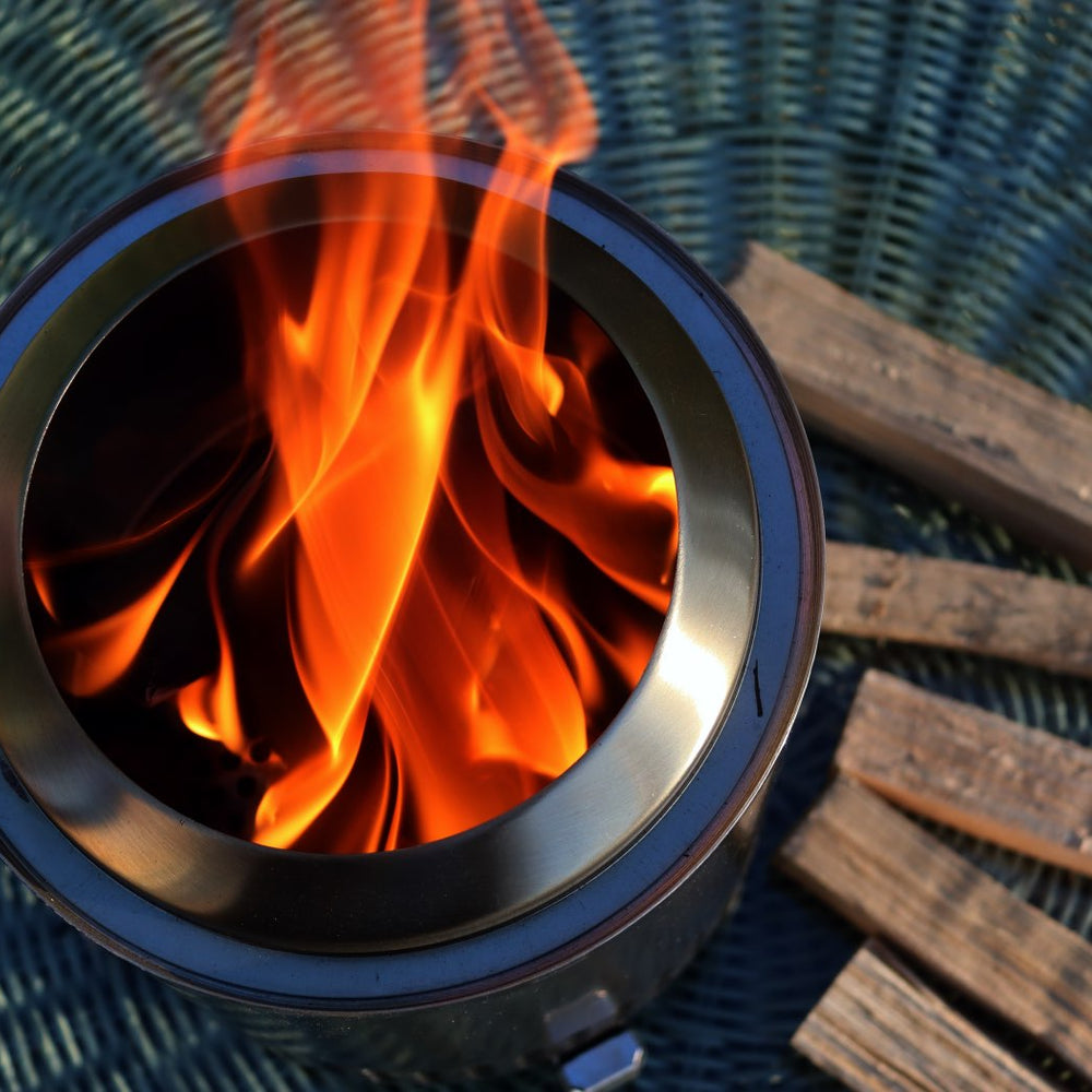 
                      
                        Love Logs Mini Fire Pit Wood burning cleanly in Solo Mesa XL
                      
                    