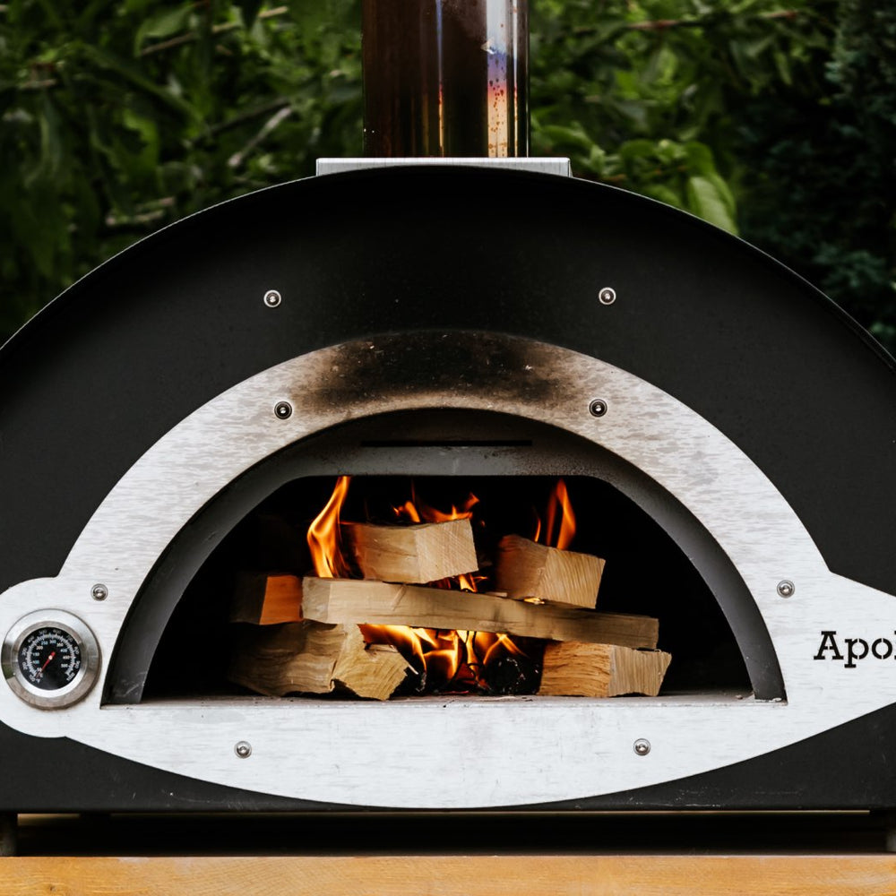 Love Logs Pizza Oven Wood Lighting in a Steel Pizza Oven