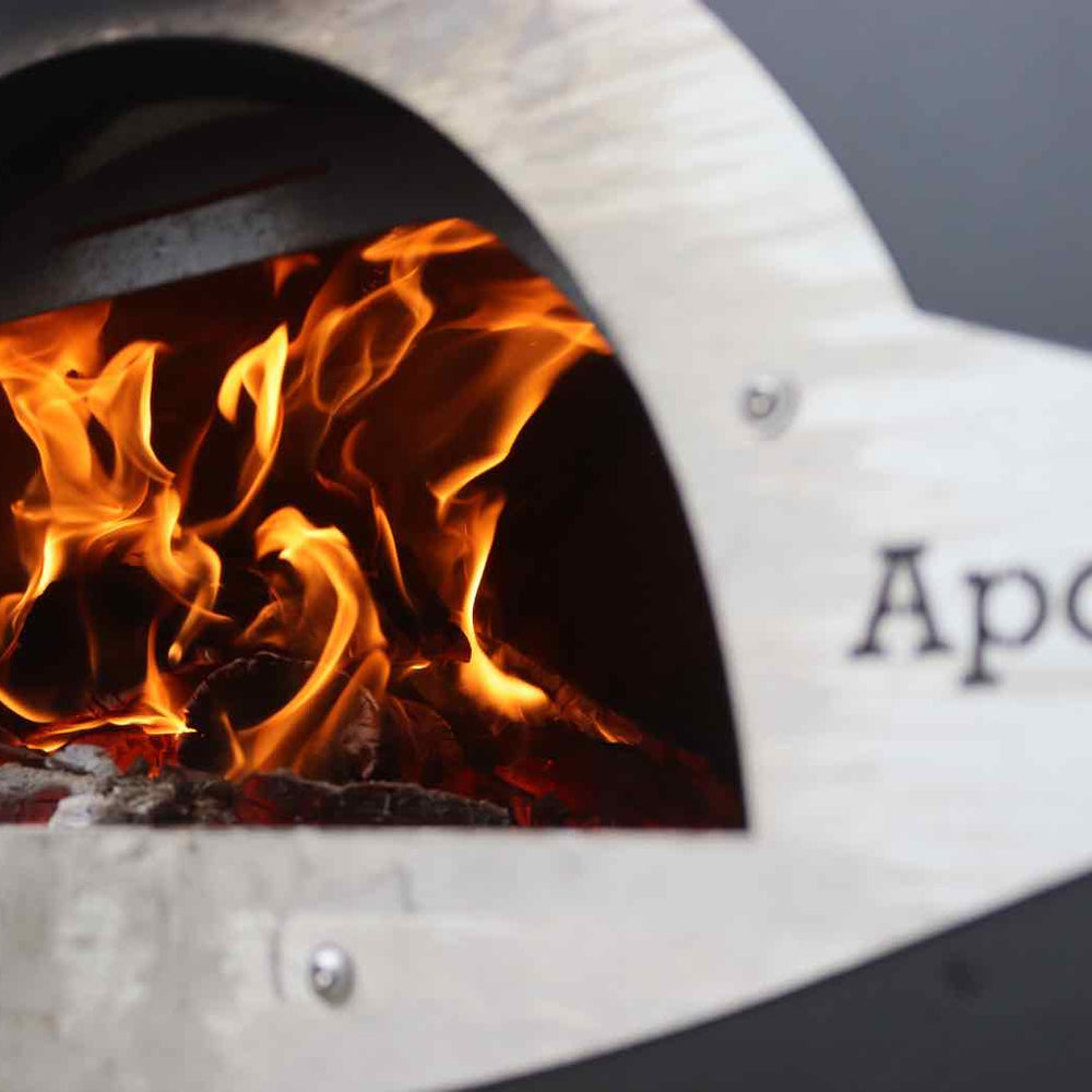 Love Logs Pizza Oven Wood Burning in a Steel Pizza Oven