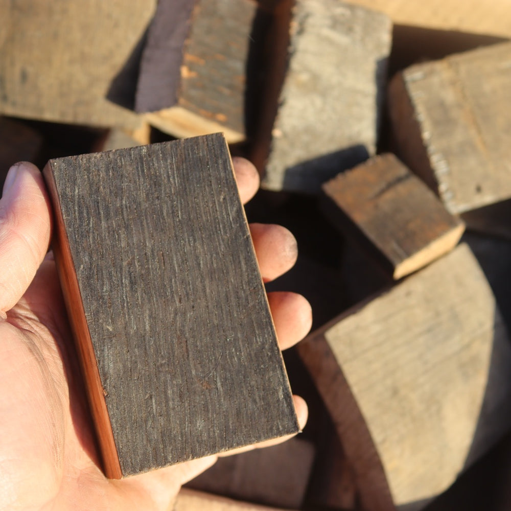 Photo of whisky barrel chunks for use with kettle barbecues, ceramic kamados and smokers