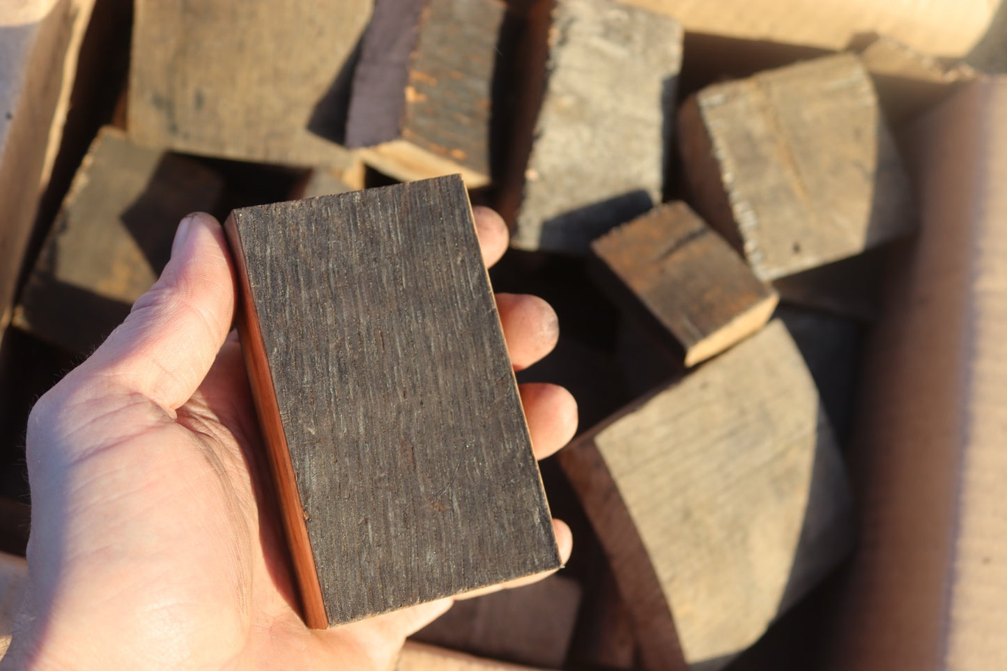Photo of whisky barrel chunks for use with kettle barbecues, ceramic kamados and smokers